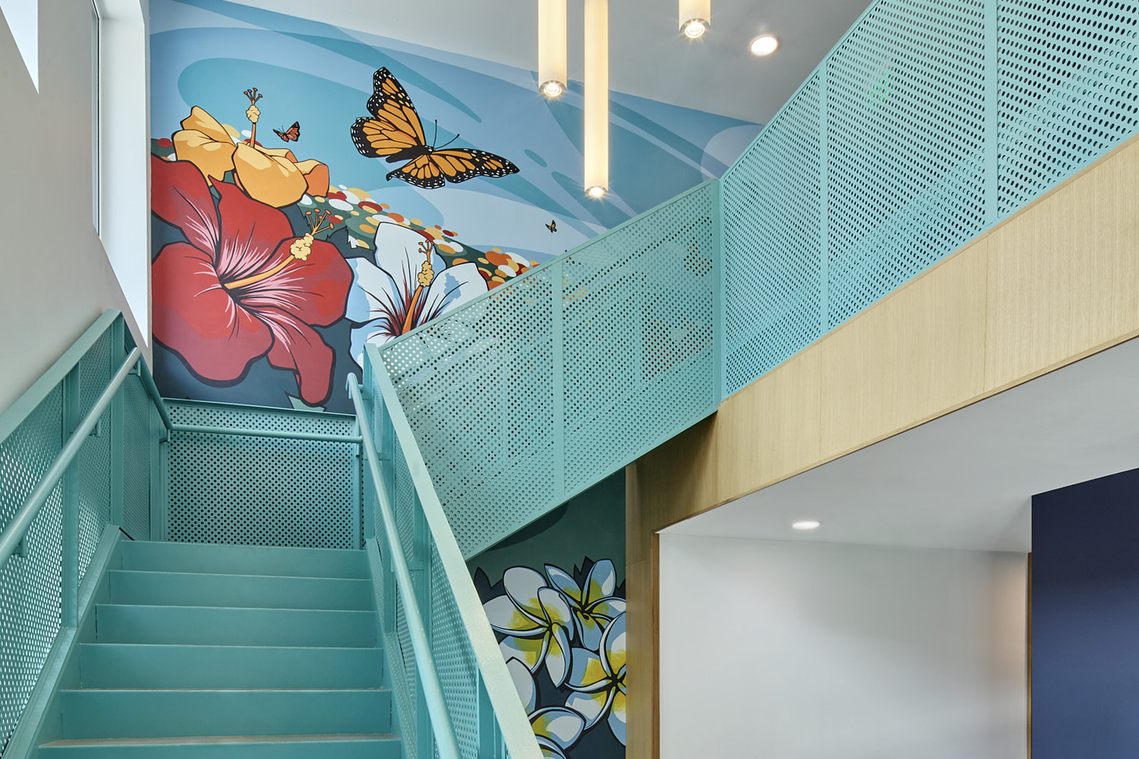 mural view going up the staircase